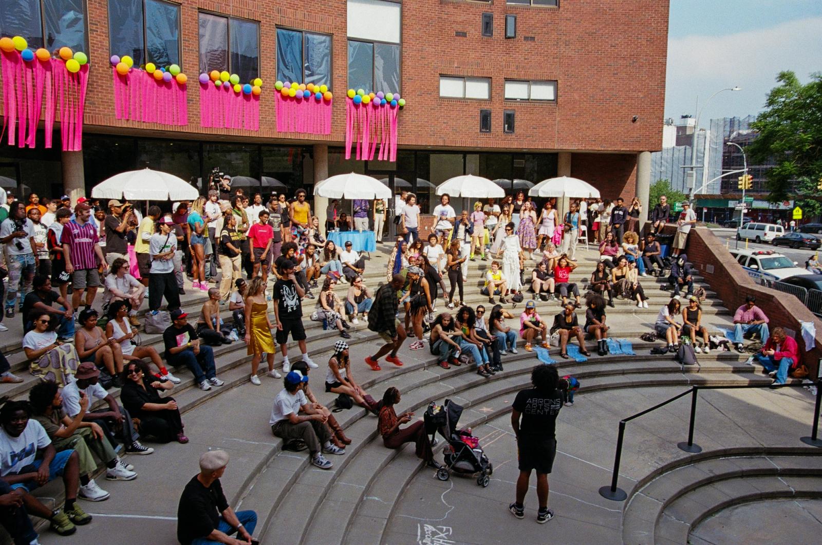 A public gathering outside Abrons Arts Center