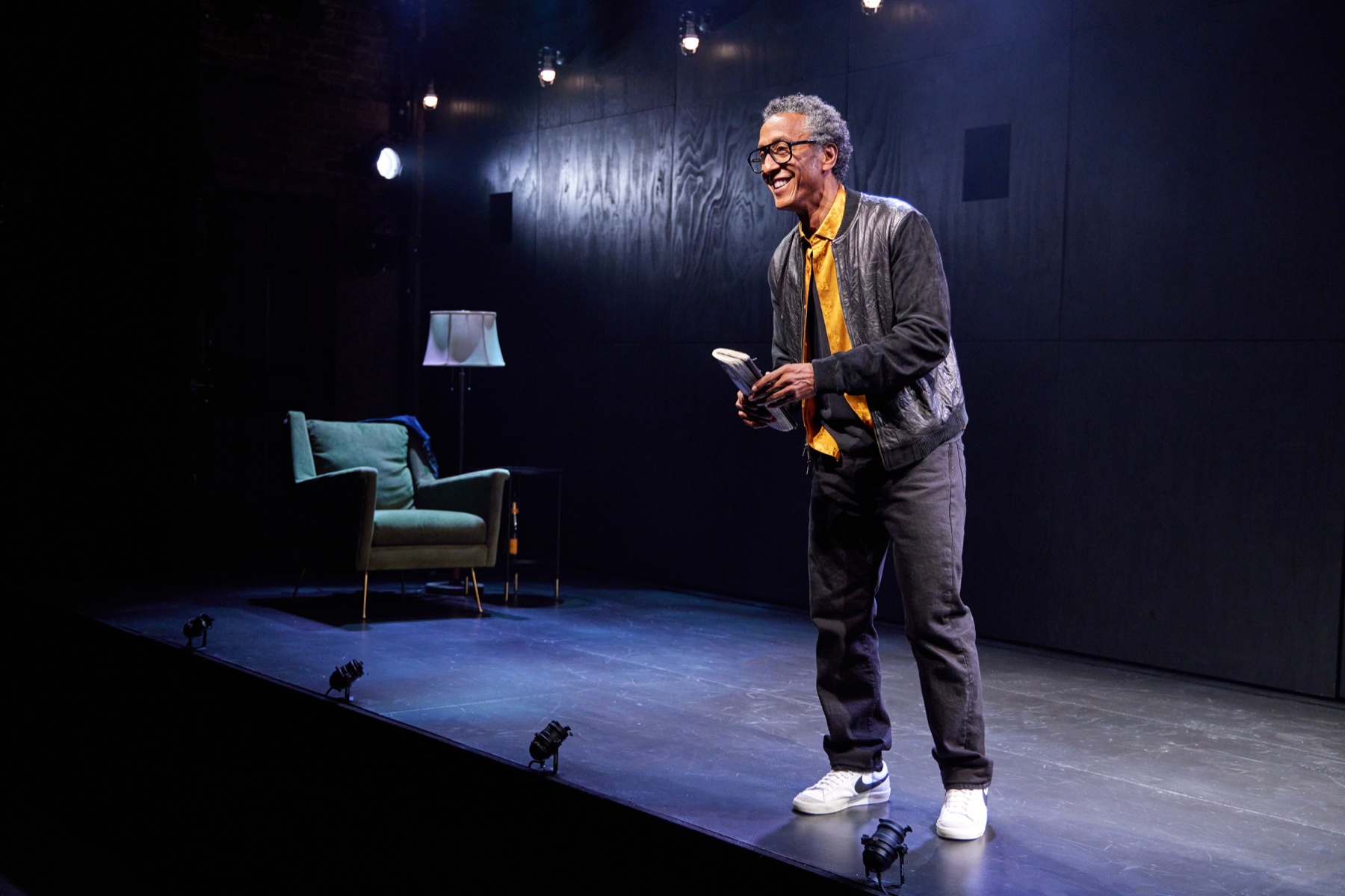 Andre Royo smiling during Drinking in America at Minetta Lane Theatre